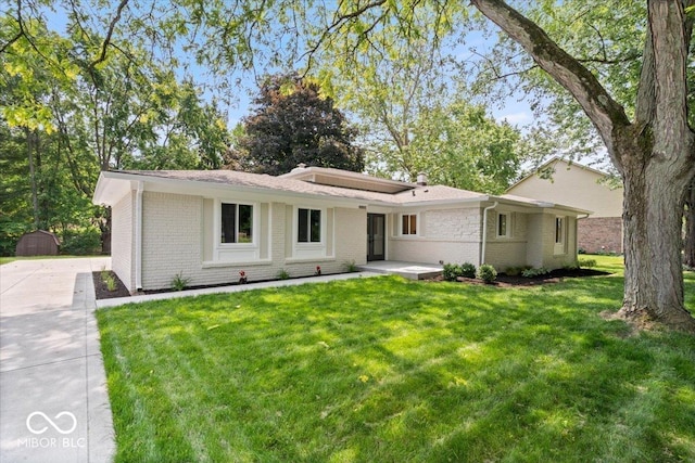 11123 Haverstick Rd, Carmel, IN 46033 - ranch-style house featuring brick siding and a front yard