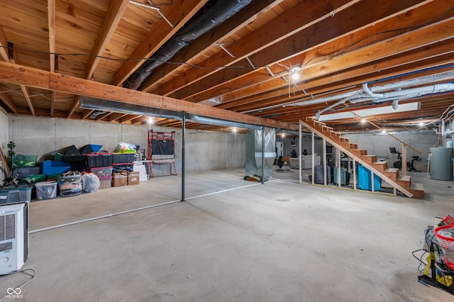 10274 S 400 W, Pendleton, IN 46064 - unfinished basement featuring stairway and gas water heater