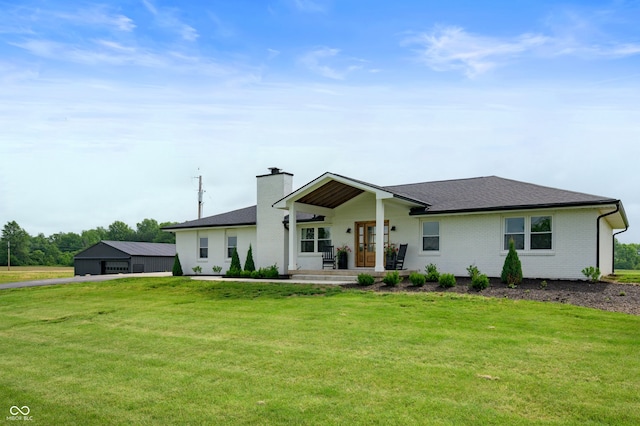10274 S 400 W, Pendleton, IN 46064 - view of front facade with a front lawn, a chimney, and roof with shingles