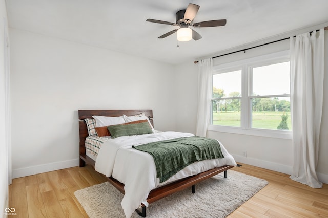 10274 S 400 W, Pendleton, IN 46064 - bedroom featuring light wood finished floors and ceiling fan