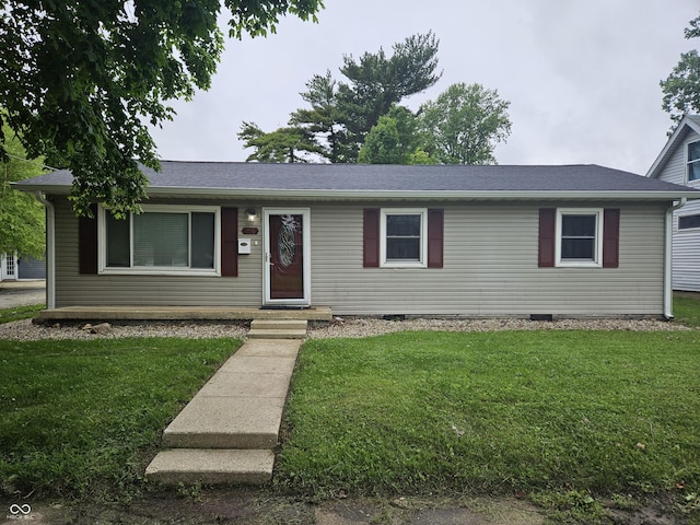 ranch-style house with a front yard and crawl space