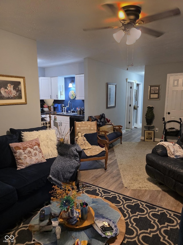 6305 W Hickory Hill Dr, North Vernon, IN 47265 - living room with a ceiling fan and wood finished floors