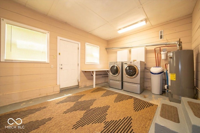 5 E Jefferson St, Maxwell, IN 46154 - laundry room featuring water heater, washing machine and clothes dryer, and wood walls