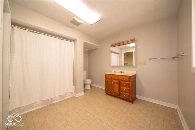 5 E Jefferson St, Maxwell, IN 46154 - full bathroom featuring toilet, vanity, baseboards, and shower / bath combo