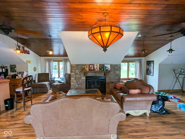 6336 N Carroll Rd, Indianapolis, IN 46235 - living area featuring wooden ceiling, wood finished floors, a fireplace, vaulted ceiling, and ceiling fan
