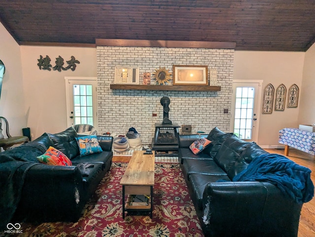 6336 N Carroll Rd, Indianapolis, IN 46235 - living area featuring wood finished floors and a wood stove