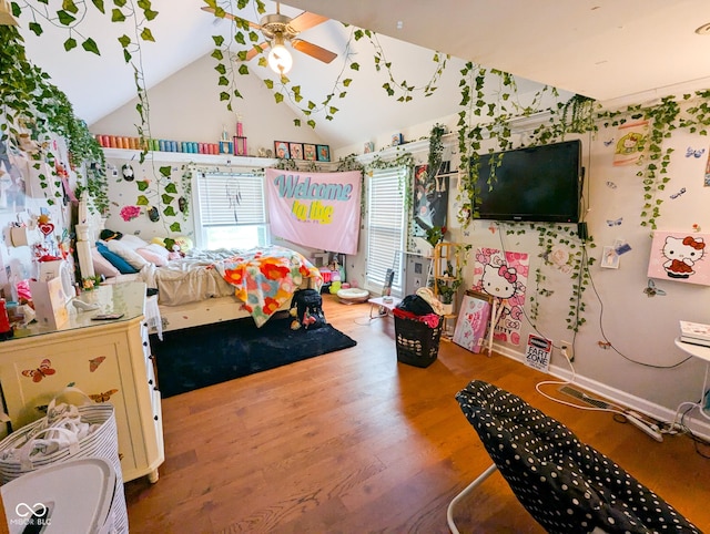 6336 N Carroll Rd, Indianapolis, IN 46235 - bedroom featuring vaulted ceiling and wood finished floors