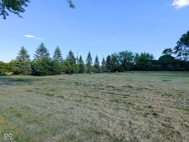 6336 N Carroll Rd, Indianapolis, IN 46235 - view of green lawn featuring a view of rural / pastoral area
