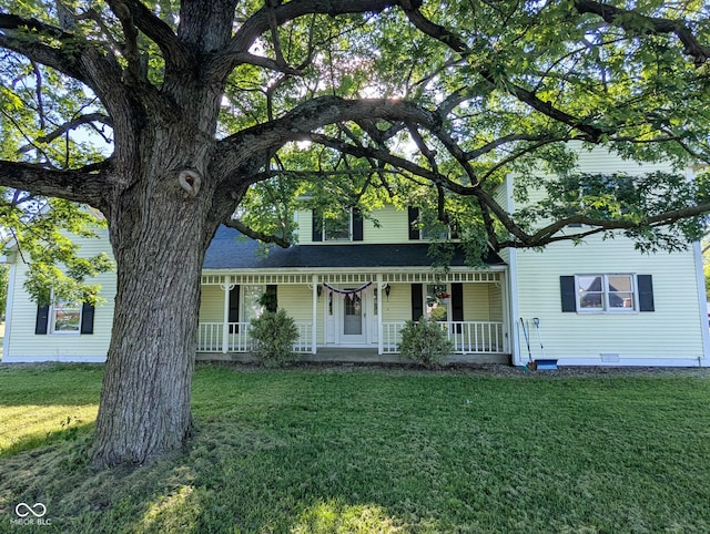 6336 N Carroll Rd, Indianapolis, IN 46235 - view of front of property with covered porch, crawl space, and a front yard