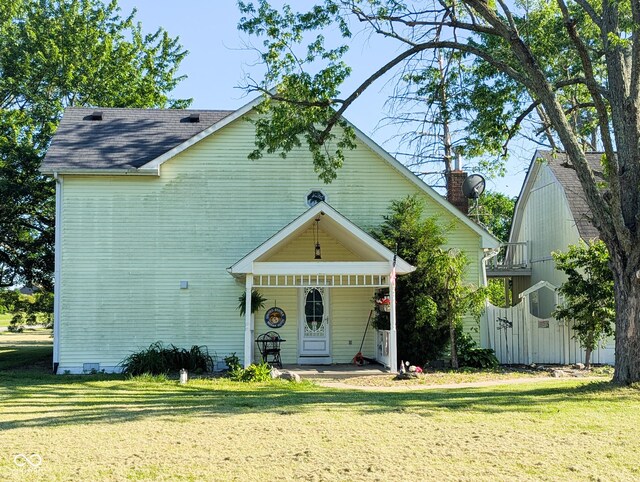 6336 N Carroll Rd, Indianapolis, IN 46235 - view of front of property featuring a front yard and covered porch