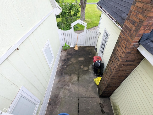 6336 N Carroll Rd, Indianapolis, IN 46235 - view of patio / terrace featuring a gate