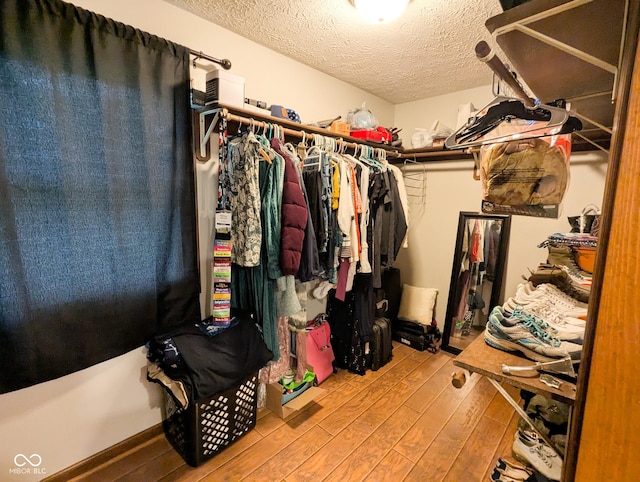 6336 N Carroll Rd, Indianapolis, IN 46235 - walk in closet featuring wood-type flooring