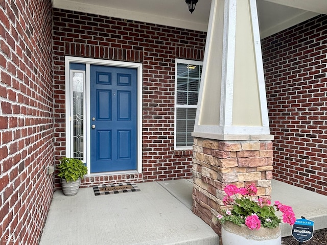 11700 Harvest Moon Dr, Noblesville, IN 46060 - view of exterior entry featuring a porch and brick siding