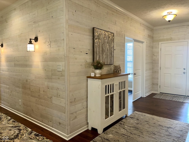 11700 Harvest Moon Dr, Noblesville, IN 46060 - entrance foyer featuring ornamental molding, dark wood-type flooring, and wood walls