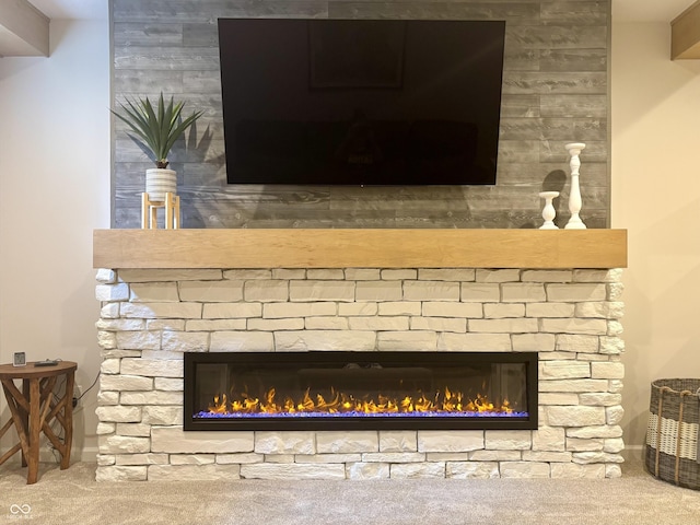11700 Harvest Moon Dr, Noblesville, IN 46060 - detailed view of carpet flooring and a glass covered fireplace