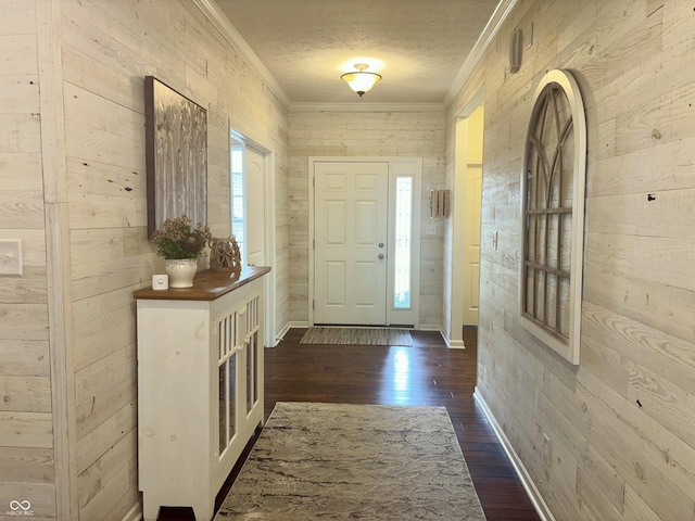 11700 Harvest Moon Dr, Noblesville, IN 46060 - entryway with ornamental molding, wood walls, dark wood finished floors, and a textured ceiling