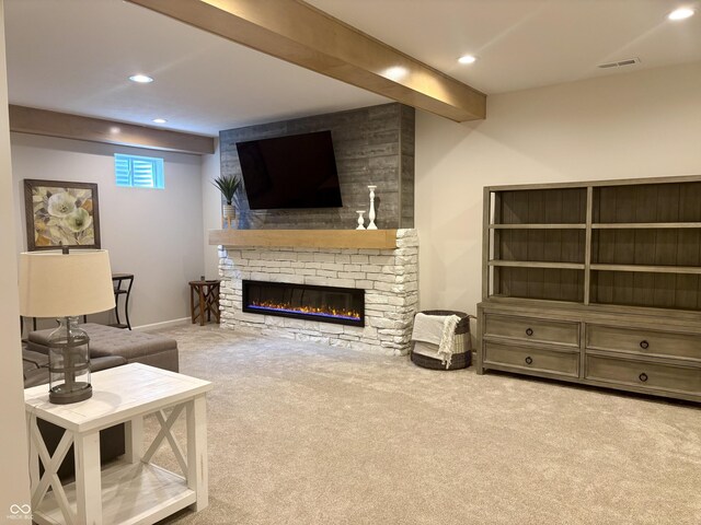 11700 Harvest Moon Dr, Noblesville, IN 46060 - living room featuring carpet flooring, recessed lighting, and a stone fireplace