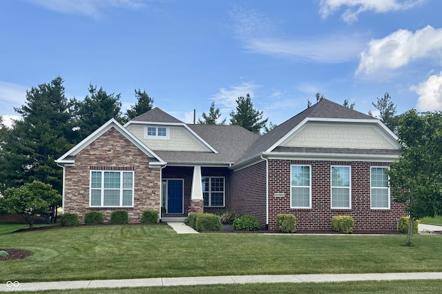 11700 Harvest Moon Dr, Noblesville, IN 46060 - craftsman-style home featuring a front lawn, stone siding, and roof with shingles