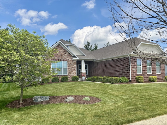 11700 Harvest Moon Dr, Noblesville, IN 46060 - craftsman house with a front yard, a shingled roof, brick siding, and stone siding