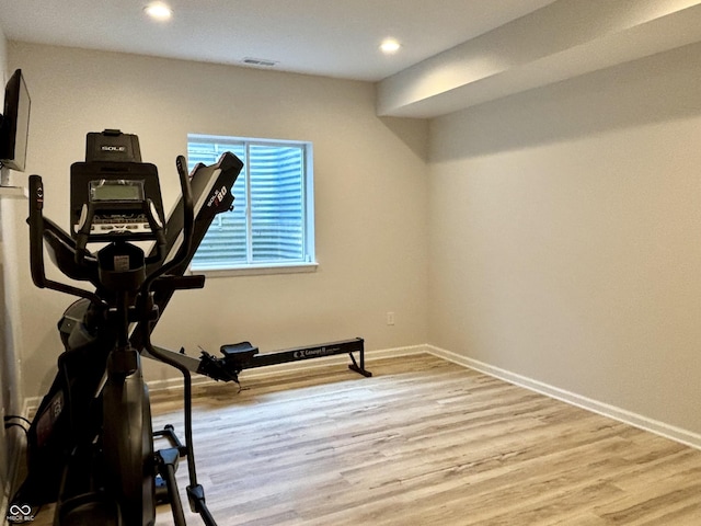 11700 Harvest Moon Dr, Noblesville, IN 46060 - exercise area featuring wood finished floors and recessed lighting