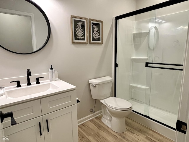 11700 Harvest Moon Dr, Noblesville, IN 46060 - bathroom with wood finished floors, a shower stall, and vanity