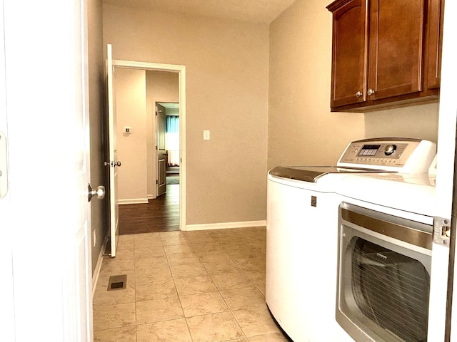 11700 Harvest Moon Dr, Noblesville, IN 46060 - laundry area featuring cabinet space and washer and dryer