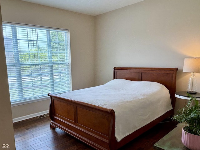 11700 Harvest Moon Dr, Noblesville, IN 46060 - bedroom featuring multiple windows and dark wood finished floors