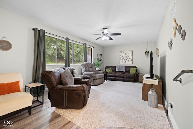 213 Terre Vista Dr, Terre Haute, IN 47803 - living room featuring ceiling fan, wood finished floors, and baseboards