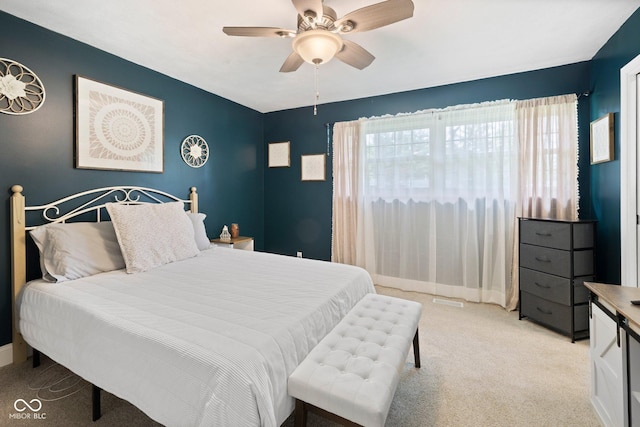 213 Terre Vista Dr, Terre Haute, IN 47803 - bedroom featuring light colored carpet, ceiling fan, and baseboards