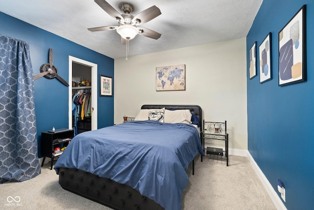 213 Terre Vista Dr, Terre Haute, IN 47803 - carpeted bedroom featuring ceiling fan, baseboards, a closet, and a spacious closet