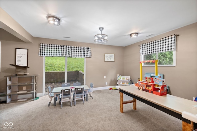 213 Terre Vista Dr, Terre Haute, IN 47803 - rec room featuring carpet floors and baseboards