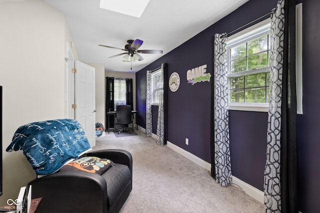 213 Terre Vista Dr, Terre Haute, IN 47803 - sitting room featuring carpet floors, healthy amount of natural light, baseboards, and a skylight
