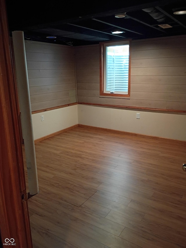 1008 E 61st St, Indianapolis, IN 46220 - below grade area with wood finished floors and baseboards