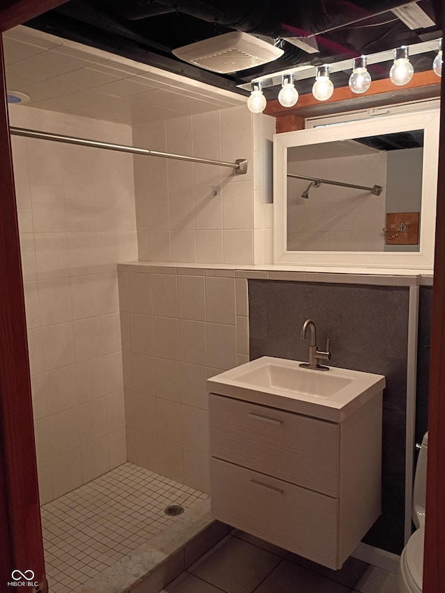 1008 E 61st St, Indianapolis, IN 46220 - bathroom with vanity, a stall shower, toilet, and tile patterned floors
