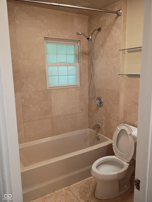 1008 E 61st St, Indianapolis, IN 46220 - full bath with toilet, washtub / shower combination, and tile patterned floors