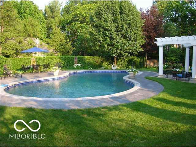 9510 Copley Dr, Indianapolis, IN 46260 - view of swimming pool with a yard, a pergola, and a patio area