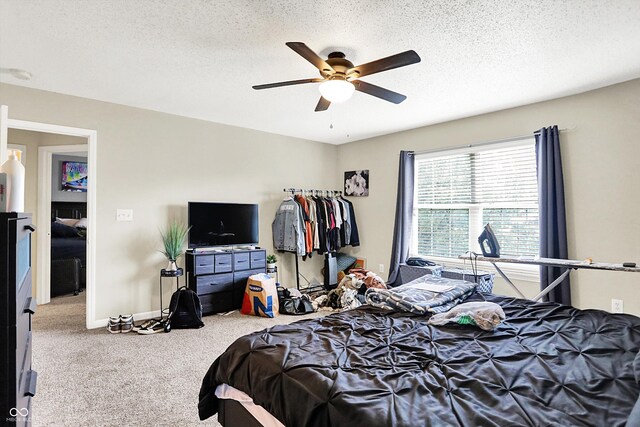15264 Ten Point Dr, Noblesville, IN 46060 - bedroom featuring carpet, a textured ceiling, ceiling fan, and baseboards