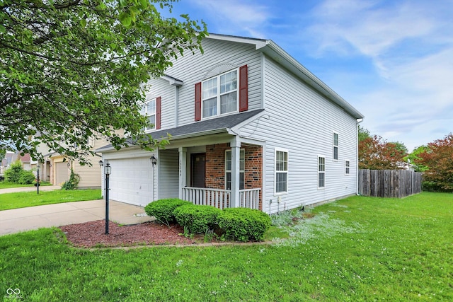 15264 Ten Point Dr, Noblesville, IN 46060 - traditional-style house with a porch, driveway, and brick siding