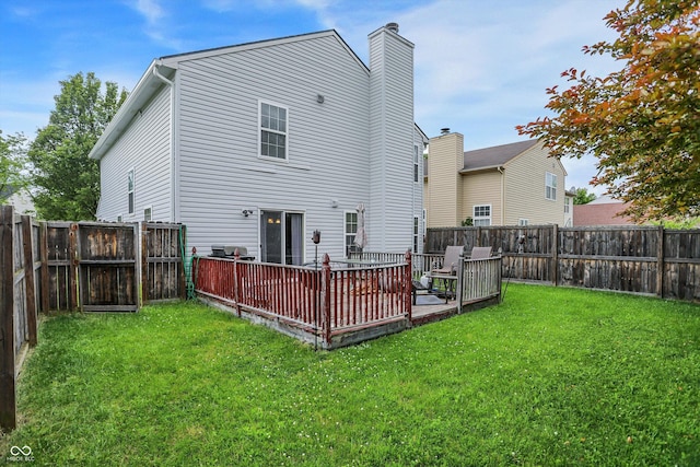 15264 Ten Point Dr, Noblesville, IN 46060 - back of house with a wooden deck and a chimney