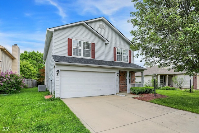 15264 Ten Point Dr, Noblesville, IN 46060 - traditional home with a garage, a front lawn, concrete driveway, and covered porch