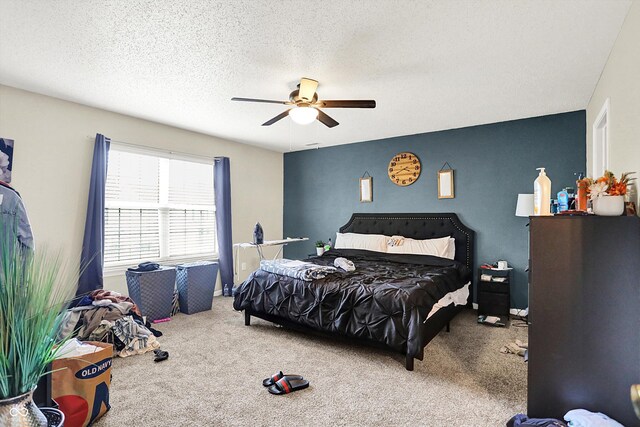 15264 Ten Point Dr, Noblesville, IN 46060 - bedroom featuring carpet, ceiling fan, and a textured ceiling