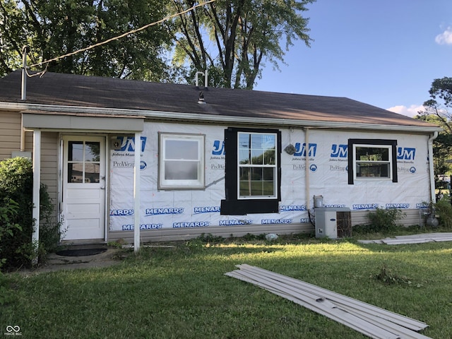 409 Parkway St, Whiteland, IN 46184 - property under construction with a front lawn and central AC unit