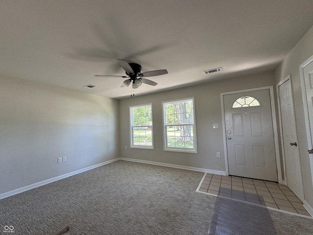 409 Parkway St, Whiteland, IN 46184 - carpeted entryway featuring a ceiling fan and baseboards