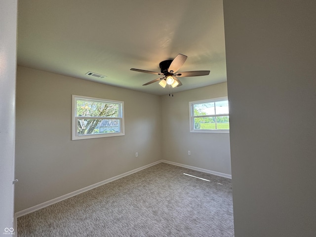 409 Parkway St, Whiteland, IN 46184 - spare room featuring baseboards and carpet floors