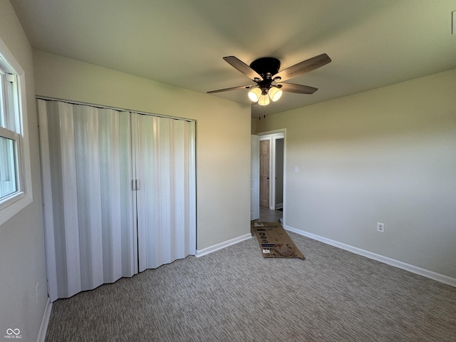 409 Parkway St, Whiteland, IN 46184 - unfurnished bedroom with baseboards, a closet, carpet floors, and ceiling fan