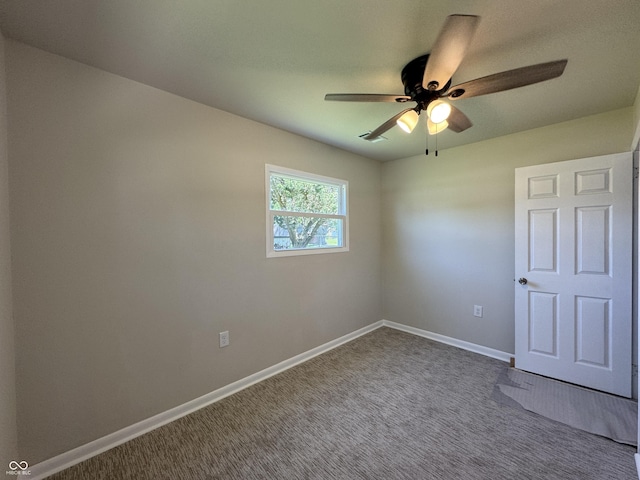 409 Parkway St, Whiteland, IN 46184 - carpeted empty room with ceiling fan and baseboards