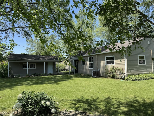 409 Parkway St, Whiteland, IN 46184 - view of grassy yard with central AC