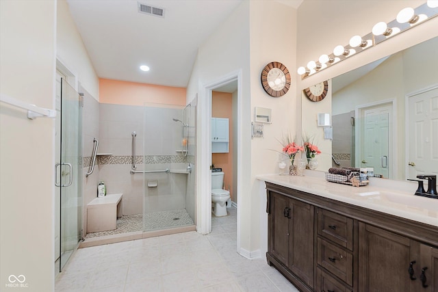 5939 Oberlies Way, Plainfield, IN 46168 - full bath with a stall shower, toilet, vanity, tile patterned floors, and recessed lighting
