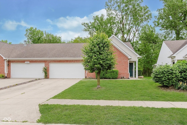 5939 Oberlies Way, Plainfield, IN 46168 - view of front of property featuring brick siding, driveway, a front yard, and a garage