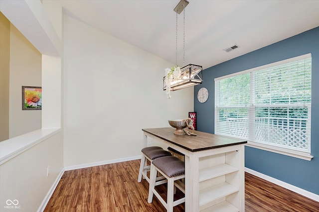 5939 Oberlies Way, Plainfield, IN 46168 - dining area featuring wood finished floors, baseboards, and a chandelier